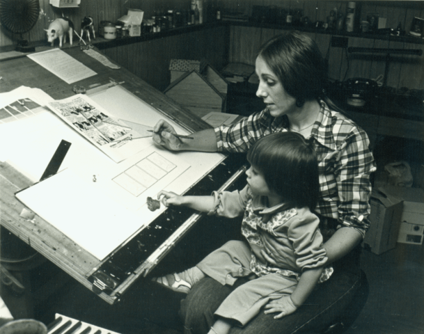 Lynn with daughter Katie in her Lynn Lake, Manitoba studio. Photo taken by the National Film Board of Canada during the making of a documentary about Lynn and her family. 1979.